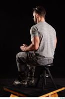  Larry Steel  1 boots dressed grey camo trousers grey t shirt shoes sitting whole body 0010.jpg